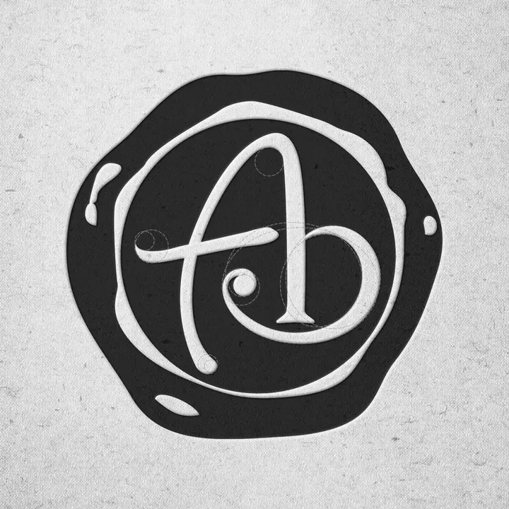 Annabena 標誌：圓形印記中的 A 與 b 字母組合